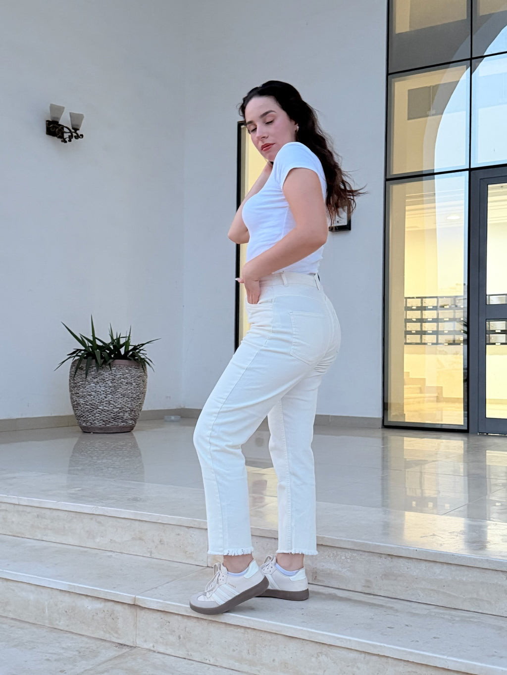Jean Mom fit moulant taille haute