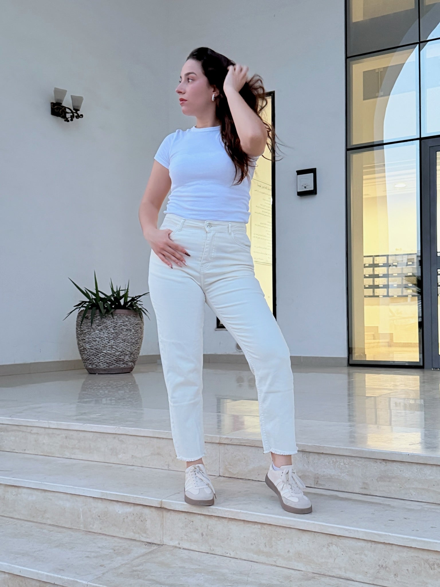 Jean Mom fit moulant taille haute