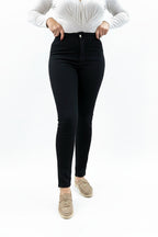 Jean skinny moullant à taille haute